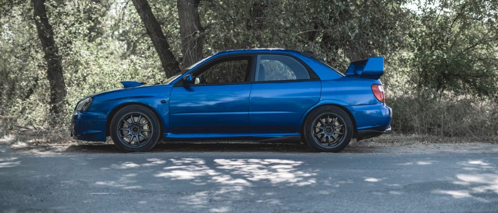 Why Choose Us - Subaru background