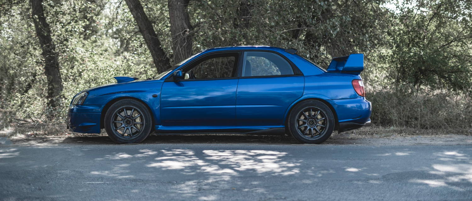 Why Choose Us - Subaru background
