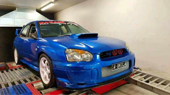 Subaru impreza Blob Eye WRX STI - Garage Full Throttle car being tuned on a dyno