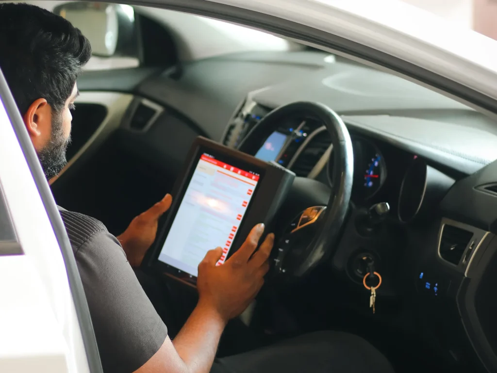 DIY dashboard warning light diagnosis using tablet before roadworthy inspection